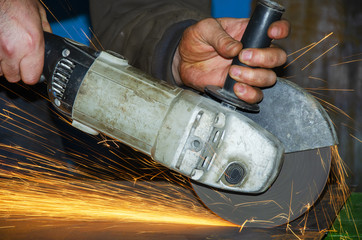 work related to cutting a sheet of metal with an angle grinder