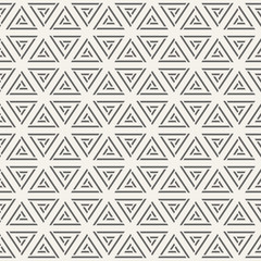 Abstract geometric pattern of triangles.
