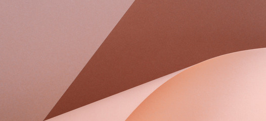 Abstract geometric shape pink beige brown color paper banner background.