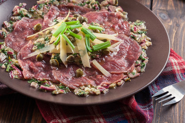 Beef carpaccio with arugula and parmesan