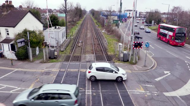 A Train passes a Level crossing in London