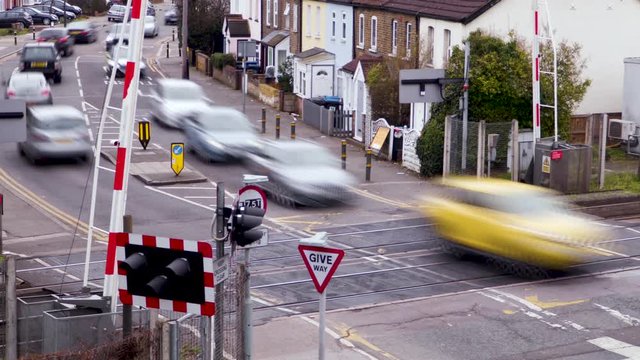 A Train passes a Level crossing in London