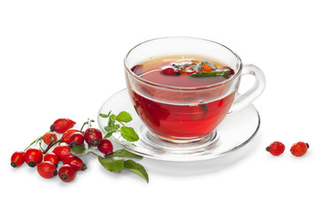 Cup of tea with wild rose isolated on white background