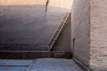 Ladder and brick walls