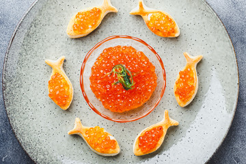 Delicious appetizer with red caviar.