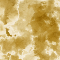Gold luxury ink and watercolor textures on white paper background. Paint leaks and ombre effects. Hand painted vintage texture.
