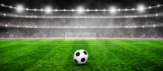 Soccer ball on stadium with illumination