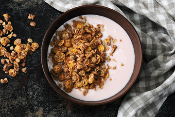 Healthy breakfast bowl with fresh yogurt and granola. Probiotics and fermented dairy products. Breakfast with probiotics.