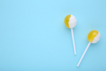 Lollipops on blue background. sweet candy concept