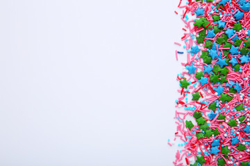 Colorful sprinkles on a isolated on white background