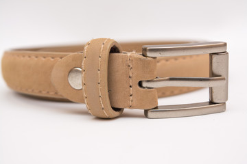 Beige leather belt on a white background.