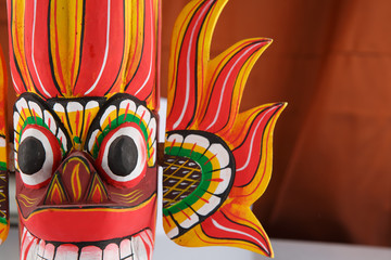 Sri Lanka national fire mask decorated in bright red and yellow colors.