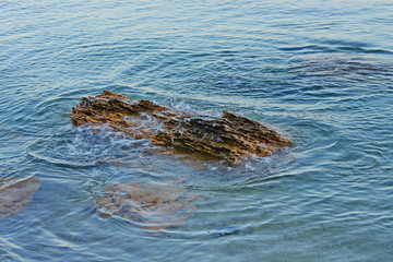 waves on rocks