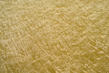 Patterns of sand by the sea.9