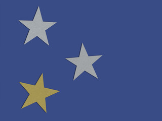 Drei Sterne auf blauen Hintergrund.