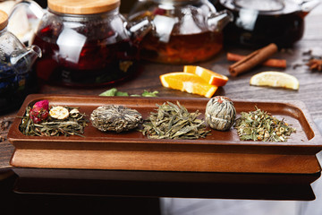 various teas on wooden panels. selective focus
