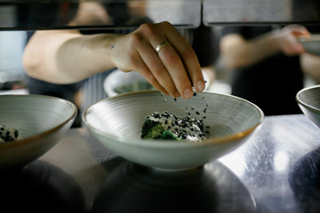 the chef throws the species into food