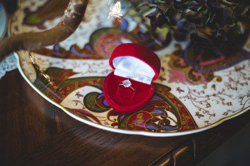 Box in the form of heart with a wedding ring inside