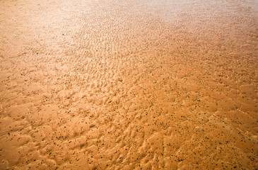 Patterns of sand by the sea.32