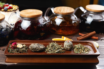 various teas on wooden panels. selective focus