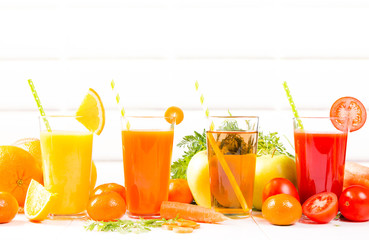 Fresh juices, Orange, Carrot, Apple, Tomato drinks with fruits and vegetables on wooden table. 