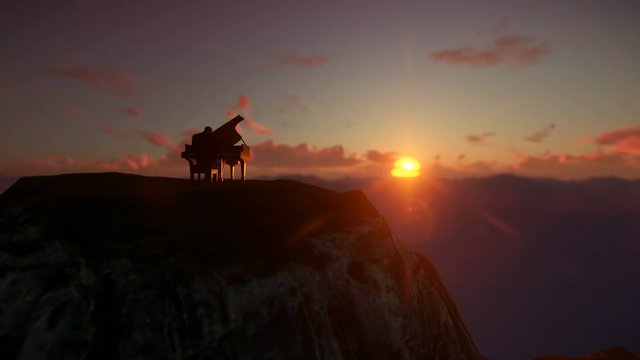 Man playing piano on top of a mountain above clouds against beautiful sunrise, drone view 4K