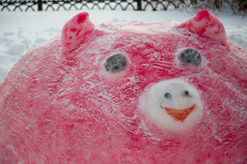 pink parasenok fashioned out of snow