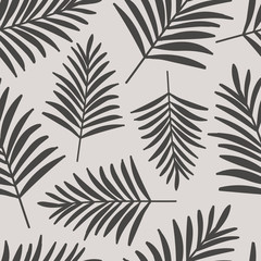 Seamless tropical vector pattern with black leaves of palm tree on white background.