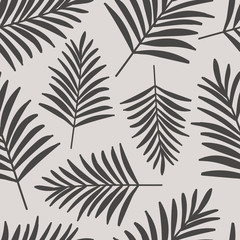 Naklejka premium Seamless tropical vector pattern with black leaves of palm tree on white background.