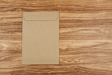 Brown envelope on wooden table