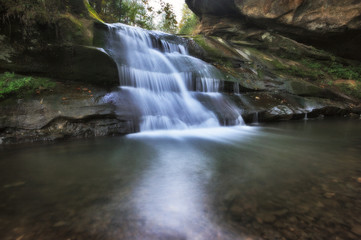 Fototapeta na wymiar picturesque waterfall. autumn waterfall in the Carpathian mountains