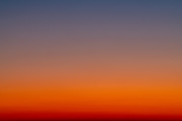 Sky gradient from blue to orange sunset