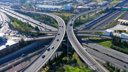 Aerial drone photo of highway multilevel junction interchange crossing road 