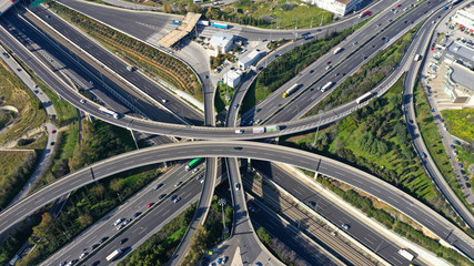 Aerial drone photo of highway multilevel junction interchange crossing road 