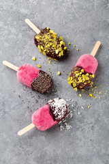 Vegan raspberry popsicles. Summer food concept with copy space for text. 
