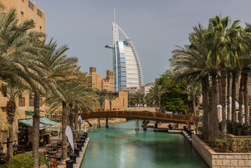 Obraz premium Dubai, United Arab Emirates - the Souk Madinat is one of the most famous malls in Dubai. Here in the picture its arabic shape and style