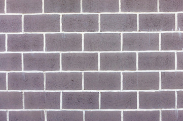 Brawn brick wall and white table lines for background