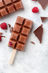 Chocolate ice cream (popsicles) with raspberry 