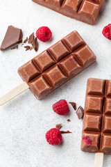 Chocolate ice cream (popsicles) with raspberry 