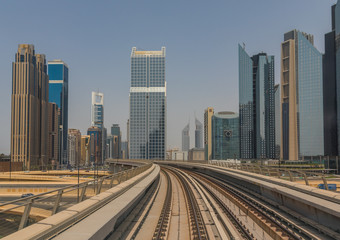 Fototapeta na wymiar Dubai, United Arab Emirates - the Dubai Metro is the fastest way to get from one side to the other of Dubai, and offers the chance to appreciate the unique skyline of the city