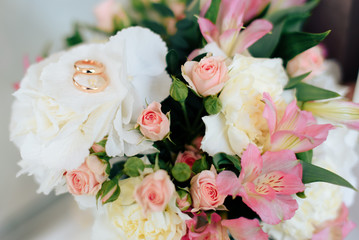 beautiful wedding bouquet with gold rings, bridal accessories
