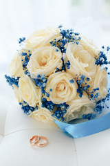 beautiful wedding bouquet with gold rings, bridal accessories