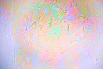 Colorful paint drops on wall, bright colors palette
