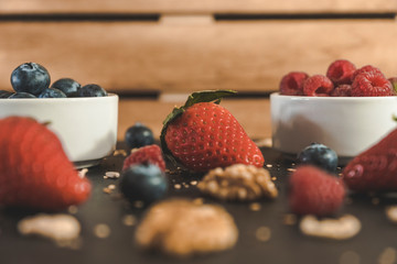 Red fruits with cereals and nuts