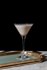Alexander, an after dinner cocktail with gin or cognac, white creme de cacao, fresh cream and  grated nutmeg