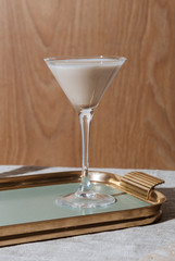 Alexander, an after dinner cocktail with gin or cognac, white creme de cacao, fresh cream and  grated nutmeg