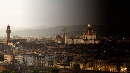 Fototapeta na wymiar Day-to-night view of downtown Florence, Italy