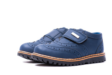 Blue baby shoes isolated on white background