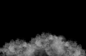 Explosion of white dust on black background.