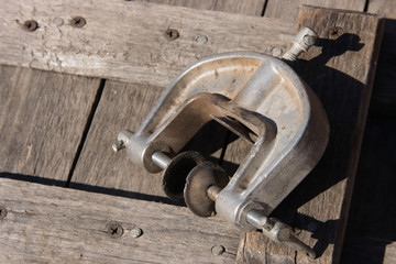 Clamp on a wooden cover